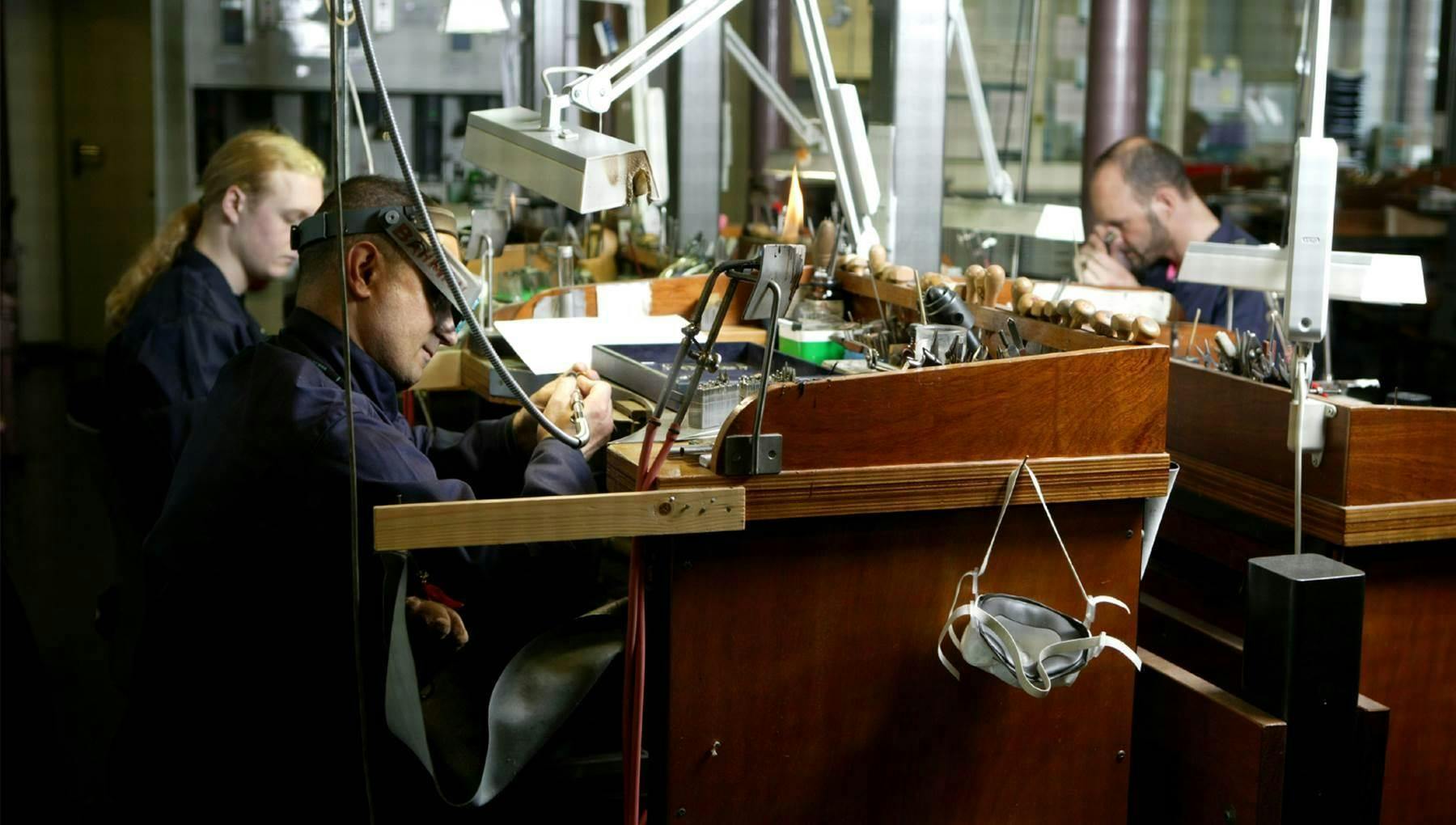 People working in the atelier of Gassan diamonds.