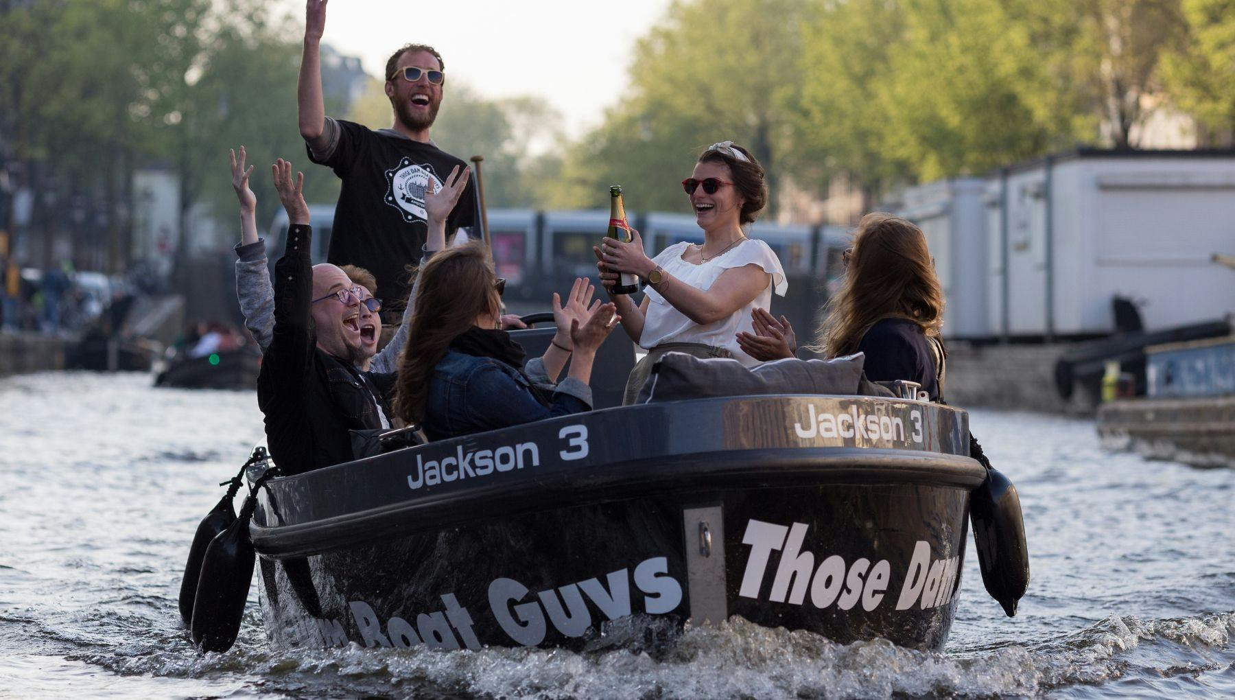 Those Dam Boat Guys people enjoying champagne on a boat
