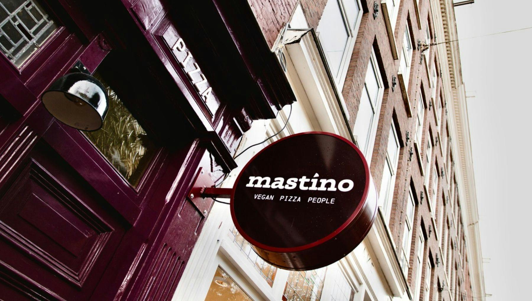 Mastino restaurant exterior logo