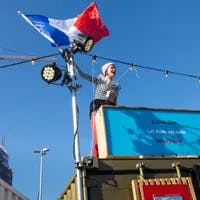 Over het IJ Festival 2019 woman waving the French flag