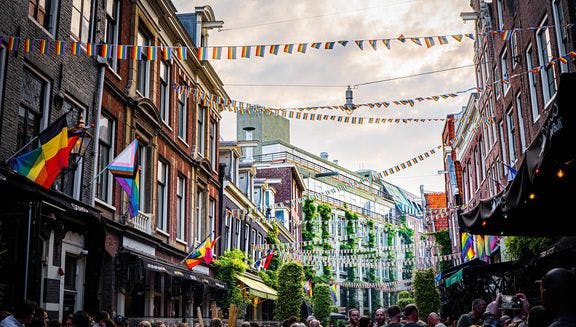Rainbow flags hanging all over the Reguliersdwarsstraat.
