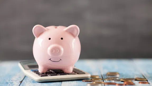 Piggy bank with calculator
business loans, financial services, piggy bank