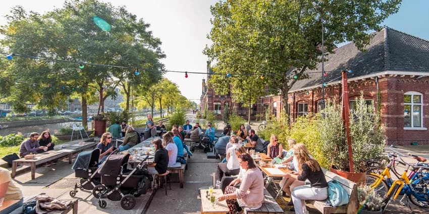 People on the terrace of De Bakkerswinkel café in Westerpark
