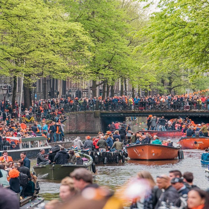 Koningsdag or King's Day is a national holiday in the Kingdom of the Netherlands. Celebrated on 27 April, the date marks the birth of King Willem-Alexander. 

Celebrations: Partying, wearing orange costumes, concerts, and traditional local gatherings.