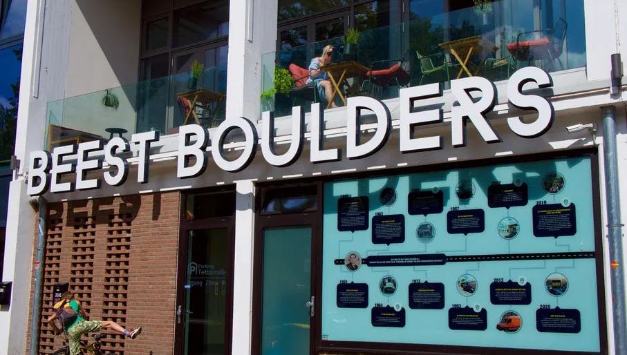 Beest Boulders sign outside and child on a bike