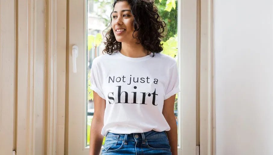 Project CeCe co-founder Melissa Wijngaarden wearing white T-shirt that reads "Not just a shirt".