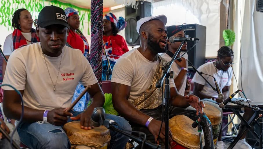 Men play drums at Kwaku Summer Festival 2023.