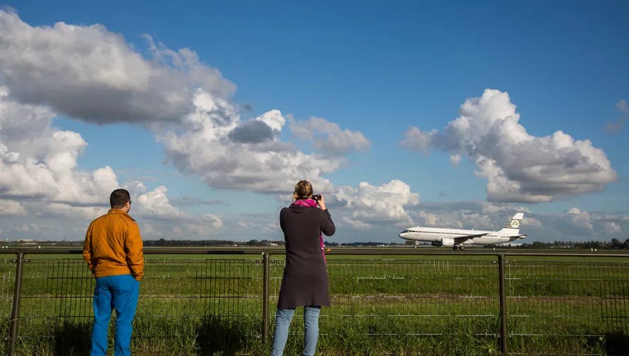 Two Airplane Watchers at the Polderbaan van Schiphol