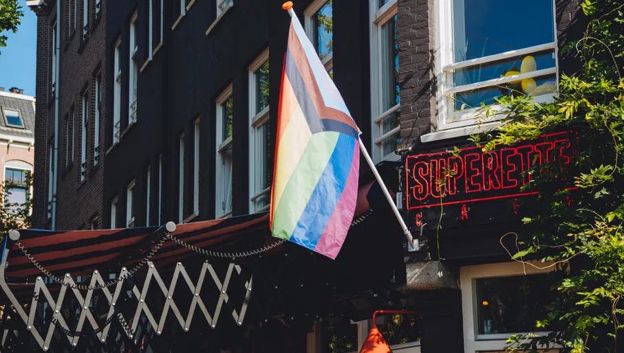 Superette exterior with Pride flag