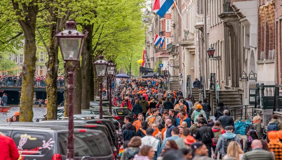 Koningsdag or King's Day is a national holiday in the Kingdom of the Netherlands. Celebrated on 27 April, the date marks the birth of King Willem-Alexander. 

Celebrations: Partying, wearing orange costumes, and traditional local gatherings.