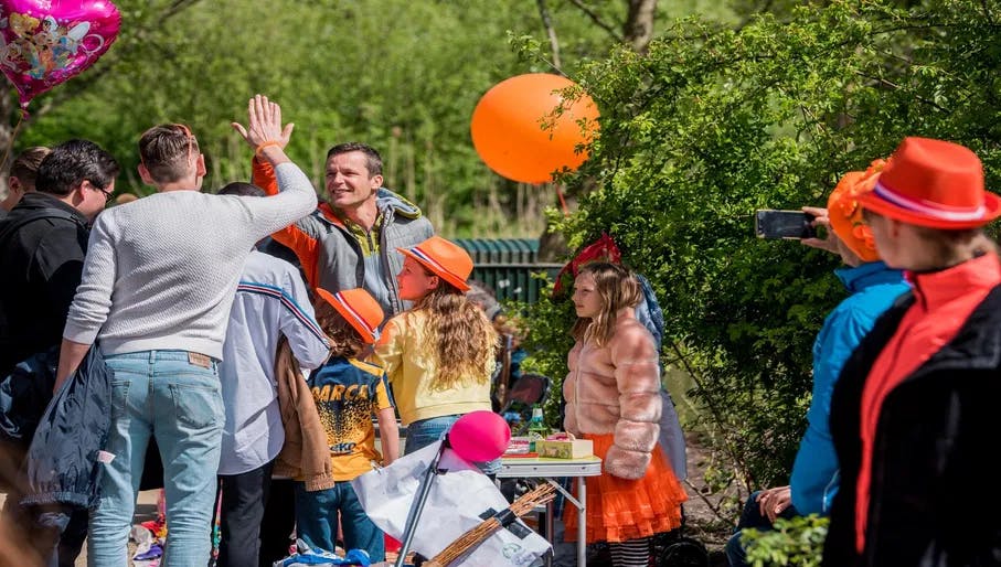 Koningsdag or King's Day is a national holiday in the Kingdom of the Netherlands. Celebrated on 27 April, the date marks the birth of King Willem-Alexander. 

Celebrations: Partying, wearing orange costumes, flea markets, and traditional local gatherings.