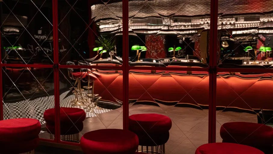 Red interiors of Ventuna Sky Lounge sky bar
