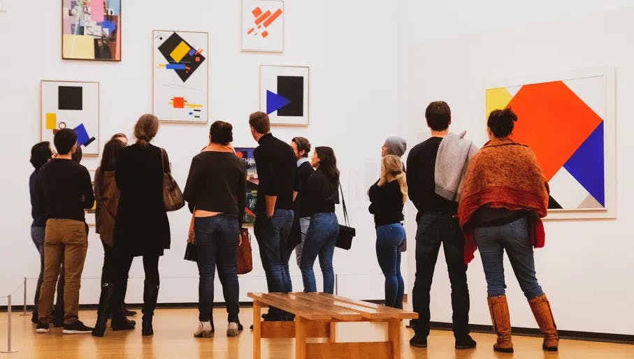 People looking at art in the Stedelijk Museum for Amsterdam Culture Club