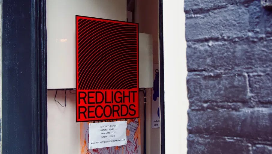Door with poster/sign of red light records shop