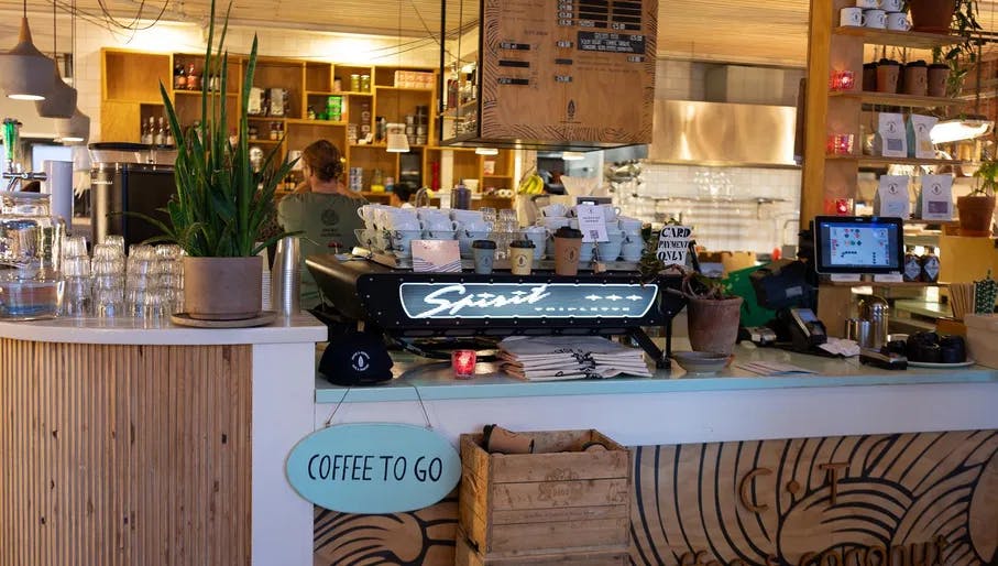 Coffee machine and interiors at CT Coffee & Coconuts cafe in De Pijp
