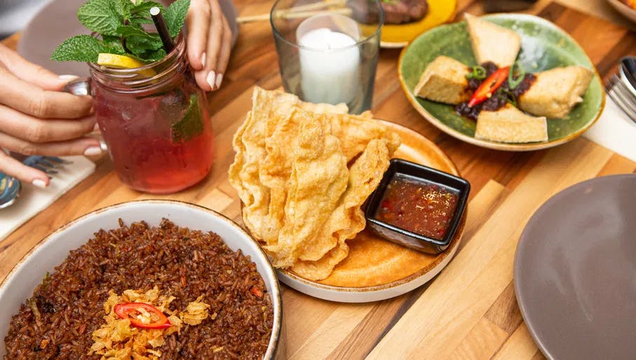 Dishes and cocktail at Warna Baru Indonesian restaurant