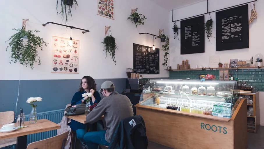 People sitting inside the Hotspot Roots.